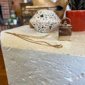 Vintage gold Chloe perfume bottle necklace